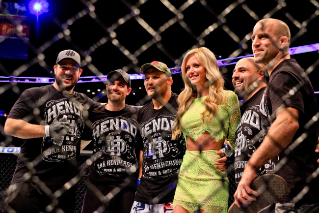 Jun 6, 2015; New Orleans, LA, USA; Dan Henderson (blue gloves) poses for a photo with his team after defeating Tim Boetsch (not pictured) during UFC Fight Night at the Smoothie King Center. Mandatory Credit: Derick E. Hingle-USA TODAY Sports